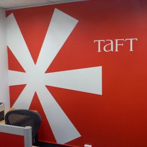 full size logo graphic on office wall