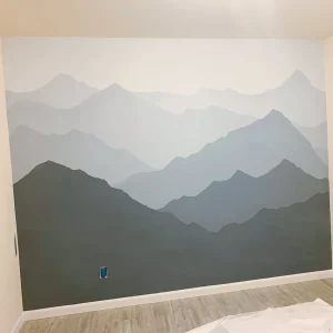 Wall graphics depicting drawing mountain shapes